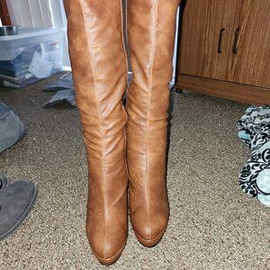 Tall stiletto heeled boot